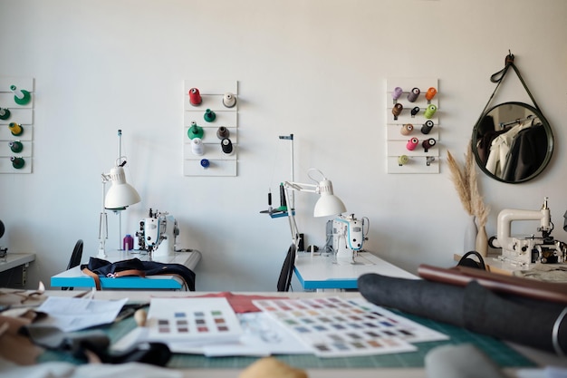 studio workspace with embroidery tools